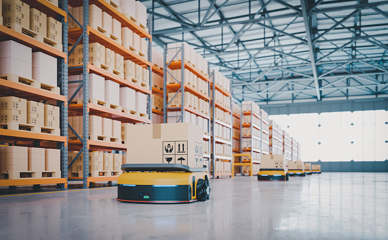 Collaborative Robots (COBOTS) moving heavy boxes