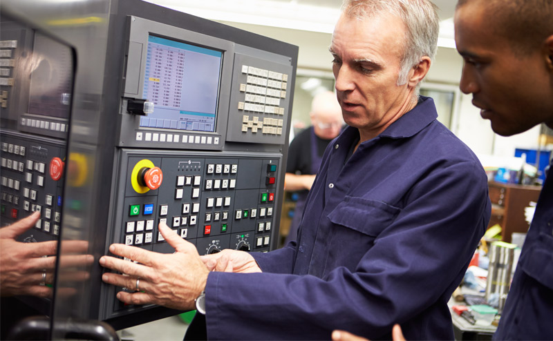 Engineers installing a new HMI